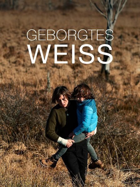 Scene from 'Geborgtes Weiss' featuring a woman carrying a child through a desolate landscape