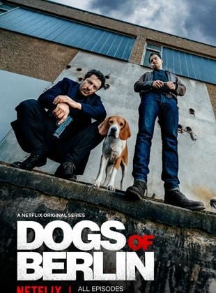 Scene from the crime drama series 'Dogs of Berlin' featuring two detectives and a dog in an urban setting.